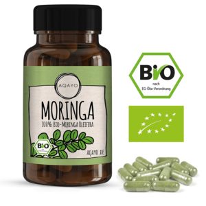 AQAYO Moringa Kapseln und Packung vor weissem Hintergrund